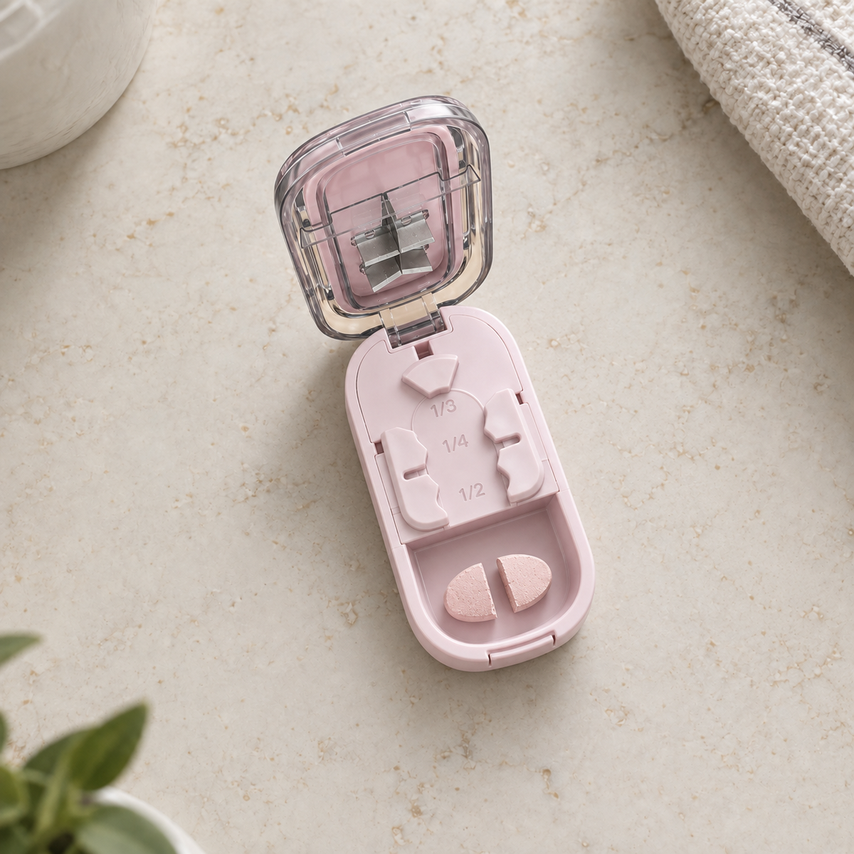 MonCacheton rose ouvert avec un comprimé découpé